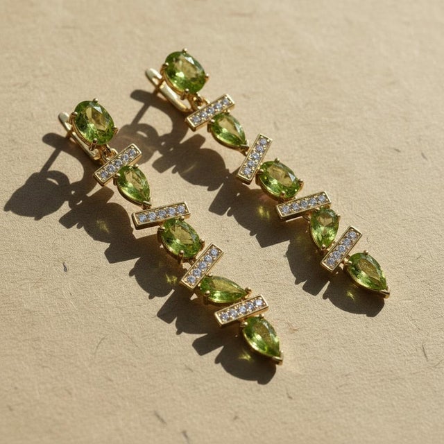 Geometric Peridot Earrings. Asymmetrical Peridot Drop Earrings. Contemporary Peridot Linear Drop Earrings in silver....