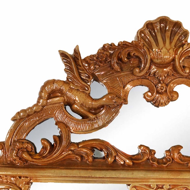Grand and ornate Vintage Dragon Mirror, featuring an intricately detailed frame with a bold, sculptural design. This...
