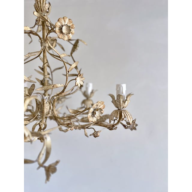 Vintage Italian floral tole chandelier with five candle-style lights, decorated with hand-shaped metal flowers, buds,...