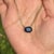 This pendant necklace features a 4.33 carat oval-cut natural blue sapphire set in 14k yellow gold. The sapphire measureing...