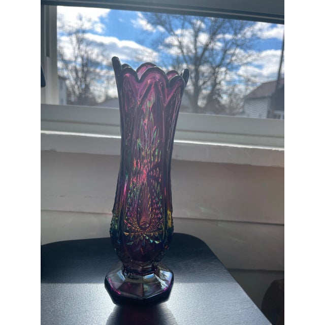Beautiful Iridescent Amethyst Carnival Glass Vase. Glows beautifully in the sunlight.