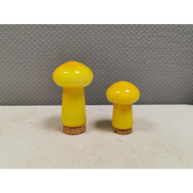 Two Holmegaard ‘Palet’ mushroom-shaped salt and pepper shakers by Michael Bang in yellow. An example of Danish mid-century...