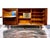 This exquisite mahogany highboard, designed by Arne Vodder and produced by Sibast Mobler, is a stunning example of mid-...