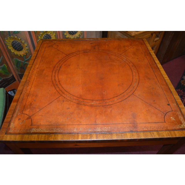 This table was purchased in England. Not sure of the wood type, possibly oak. Leather top. Great versatile table with many...