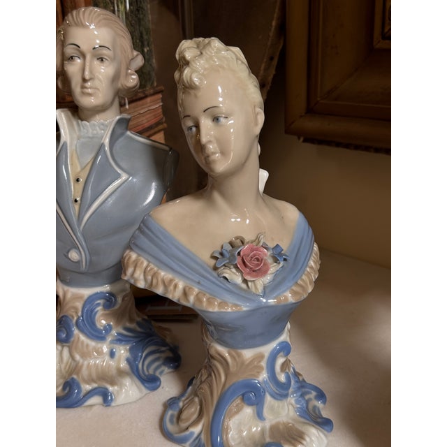 Charming matched pair of vintage Japanese porcelain portrait busts depicting an elegantly dressed gentleman and lady in...