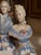 Charming matched pair of vintage Japanese porcelain portrait busts depicting an elegantly dressed gentleman and lady in...