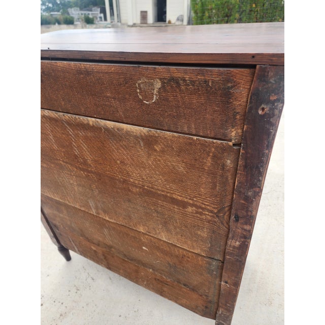 Primitive Antique American chest of drawers composed partially with repurposed wood. This is a very sturdy heavy chest of...