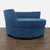 Add style and comfort to your space with this modern blue velvet round lounge chair. Its wide, circular design and soft...