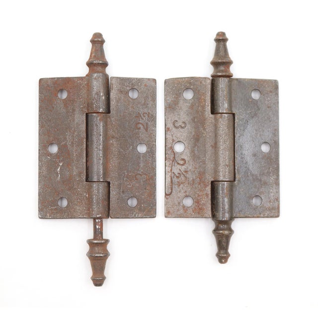 Victorian style door hinges made of cast iron with steeple tips, three knuckles, and a template hole pattern. The original...