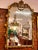 Add a dramatic European touch to your interior with this ornate French Rococo-style wall mirror, distinguished by its...