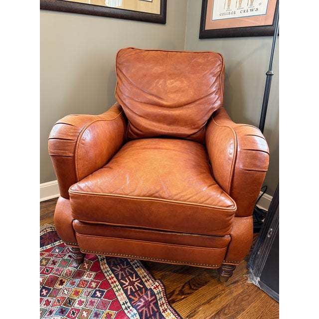 Classic club chair with the high quality leather and construction you expect from Whittemore-Sherrill. Antique brass...