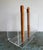 Lucite or Acrylic and Wood forms this Mid-Century Magazine Rack, attributed to Grosfeld House. The wood forming the spine...