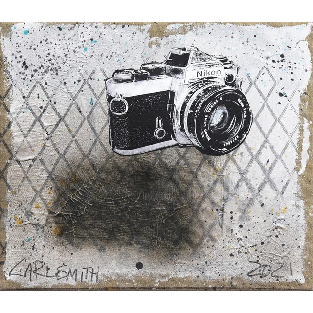 "Nikon Away" Contemporary Trompe L'oeil Still Life Painting by Carl Smith For Sale