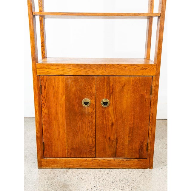 American designed oak freestanding wall unit / Room divider. Comes with storage below and shelving above. Unique and well...