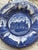 A beautiful antique blue-and-white transferware souvenir plate featuring iconic landmarks of St. Louis, Missouri. Produced...