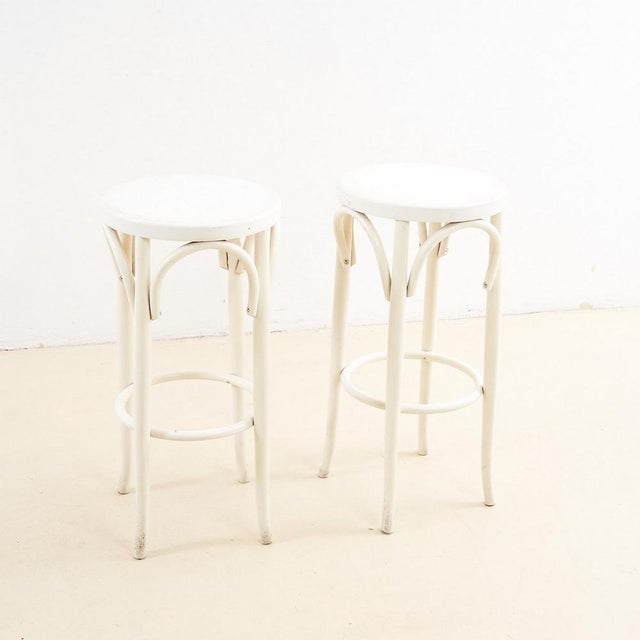 Pair of white curved wood stools height: 72 diameter: 35 additional information style: vintage production period: 1970...