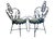 An elegant and sculptural pair of wrought-iron armchairs possibly crafted by French master wrought-iron craftsman Gilbert...