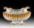 This sculptural terracotta planter is handcrafted and glazed in Italy, featuring a classic ribbed body, scrollwork rim,...