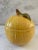 Cute vintage lidded ceramic dish in the shape of a lemon or possibly melon. Lid has a stem/leaf handle and scalloped edge...