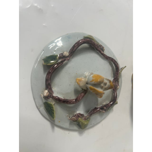 Polychrome earthenware butter dish with handles Decorated with a woven basket Wear and minor losses, see photos...