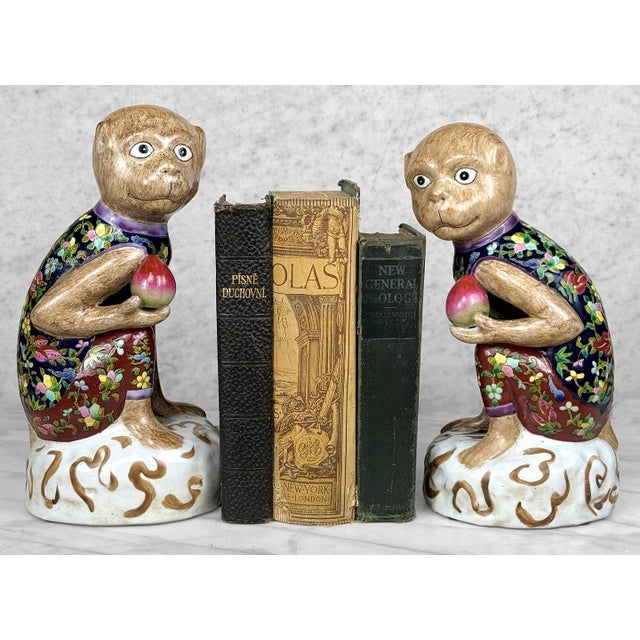 A Pair of 1970's Chinese Chinoierie Monkeys Sculpture Enameled Finished Porcelain with Vibrant Detailing Each Monkey is...