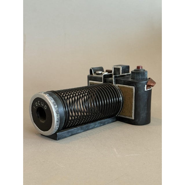 The Vintage Vandor Pelzman Designs cast resin 35 mm camera letter card holder organizer is a vintage collectible item made...