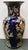 Up for sale is a Circa 1970 Chinese Fencai/Famille Rose Style on Cobalt Ground Porcelain Vase with Plum Blossoms. It...