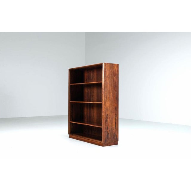 Ejvind Johansson bookcase for Ivan Gern, Denmark, 1960. A beautifully crafted Danish modern bookcase in richly figured...