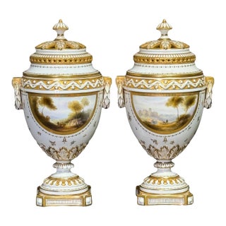 Antique Matched Royal Worcester Neoclassical White and Gilt (Gold) Porcelain Covered Urns W/ Landscaped Panels by Harry Davis, a Pair, England 1912. For Sale