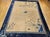 This early 20th century Art Deco Chinese rug is a meditation in landscape — a room-size textile that evokes the vast,...