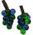 Pair of blue and green lucite grape clusters. Very good condition; wear consistent with age. Measurements per cluster.