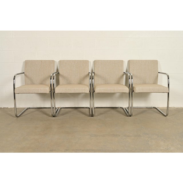 An exceptional set of four Mid-Century Modern "Brno" style tubular cantilever lounge chairs or club chairs In the manner...
