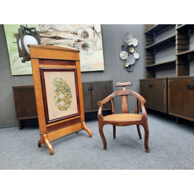 A very rare barber/hairdressing chair featuring a height-adjustable headrest. Manufactured between approx. 1880 and 1900....