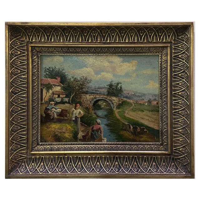 In this marvelous oil on panel painting, the painter depicts some washerwomen while they are doing their work on the banks...