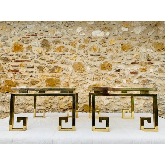 Italian Modern, Brass and Glass Side Tables, Circa 70s, Set of 2. The structures are made of metal with a brass-colored...