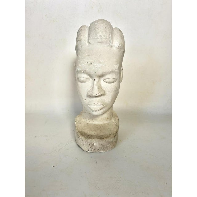 A French plaster head sculpted in the 1940s, created in a restrained yet expressive style characteristic of mid-20th-...