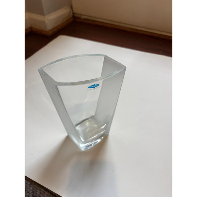 The leaded glass vase is a combination clear and frosted glass. The shape is square and a classic twist. The vase is 7.5...
