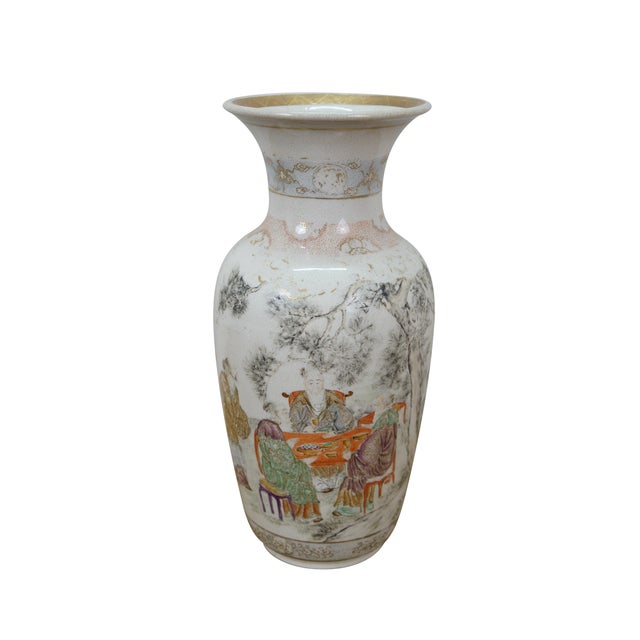 Circa late 19th century Chinese qianjiang mantel vase, delicately painted with a well-worn garden scene of wise men...