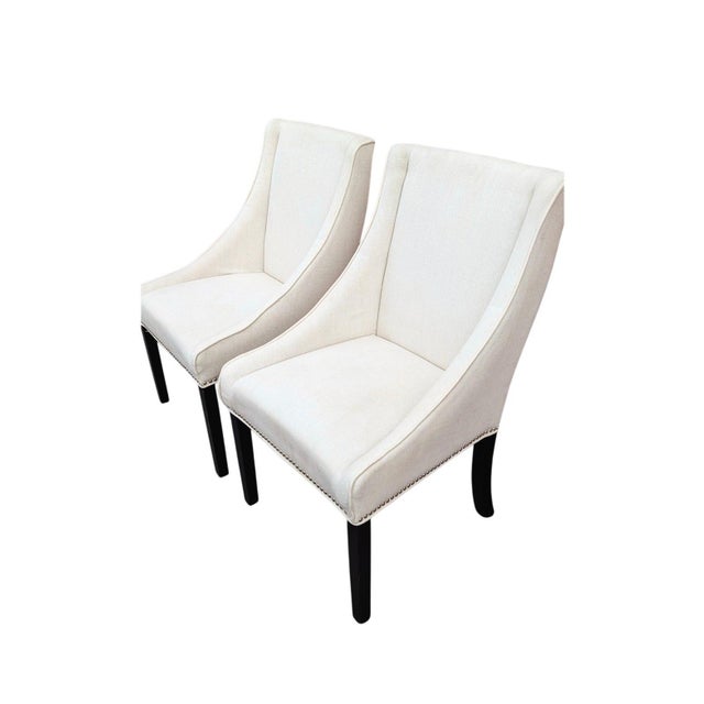 Regency Sloping-Arm Nailhead Dining Chairs – Set Add a touch of elegance and sophistication to your dining room with this...