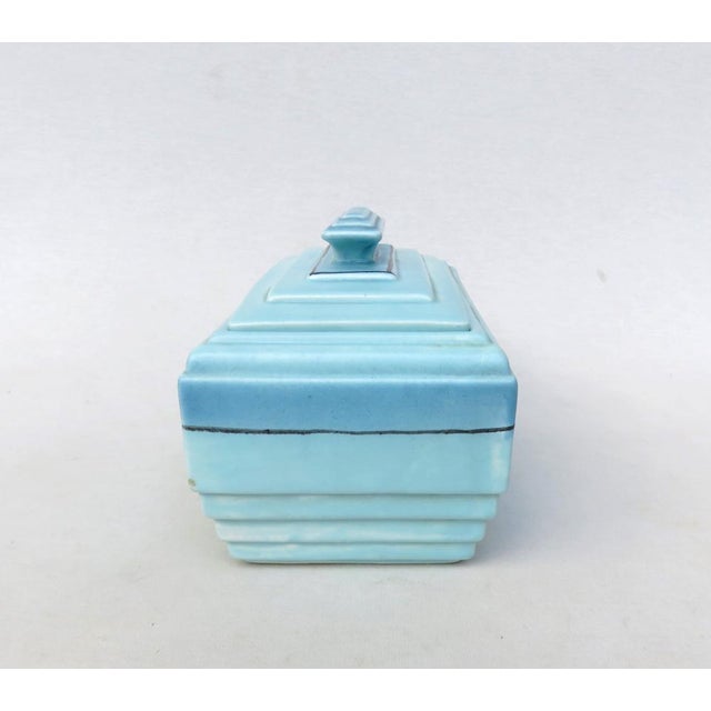 An extraordinary pastry tin or biscuit or confectionery tin from the Art Deco period in the typically strict design...