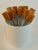 A charming set of twelve vintage cocktail forks featuring hand-carved Mexican honey onyx handles in beautiful shades of...