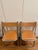 Made in Italy by Arrben, a pair of original "Tamara" Folding Chairs in a Cognac color. Thick saddle leather and polished...