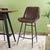 Featuring a deep brown leather seat adorned with a diamond-patterned stitching for a sophisticated look. These bar chairs...