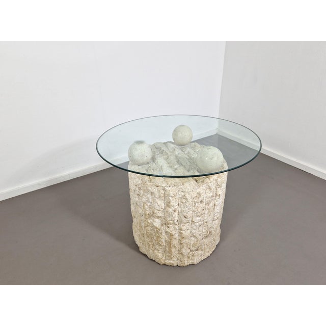 Highly sought after postmodern coffee (or side) table by Pierre Magnussen Ponte. The base is made from Mactan stone with...