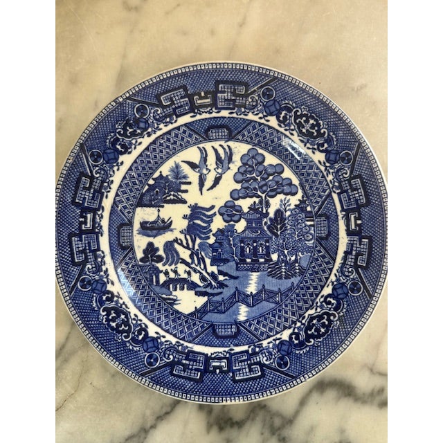 A timeless example of classic English transferware, this antique blue and white Staffordshire plate features the beloved...