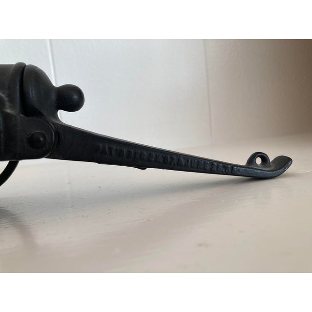 Antique Cat Iron Firecracker Toy. Original paint. Pat 1888, Canada. Pat’d DEC , 27, ‘87 & JUNE 2, ‘78 marked on other side.