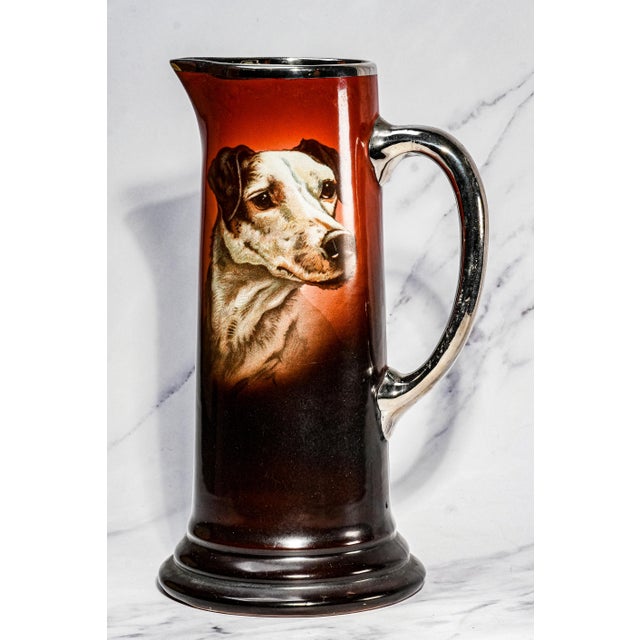 An exceptional and complete example of late 19th-century decorative ceramics, this antique Victorian pitcher and six mug...