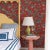 A sample of Temple Garden Lacquer Red Wallpaper Care Instructions: Wipe with damp cloth.
