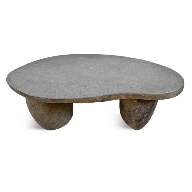 Solid heavy stone boulder outdoor coffee table or bench. Thick slab top and two boulder legs. Smooth polished top with...