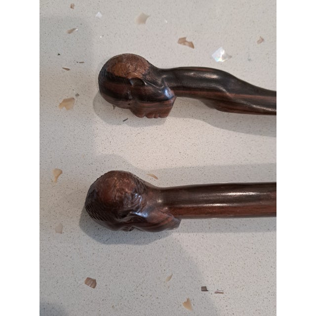Pair of 1960's hand carved wooden shoe horns One approx. 10.5 inches long One approx. 16 inches long Like new condition...